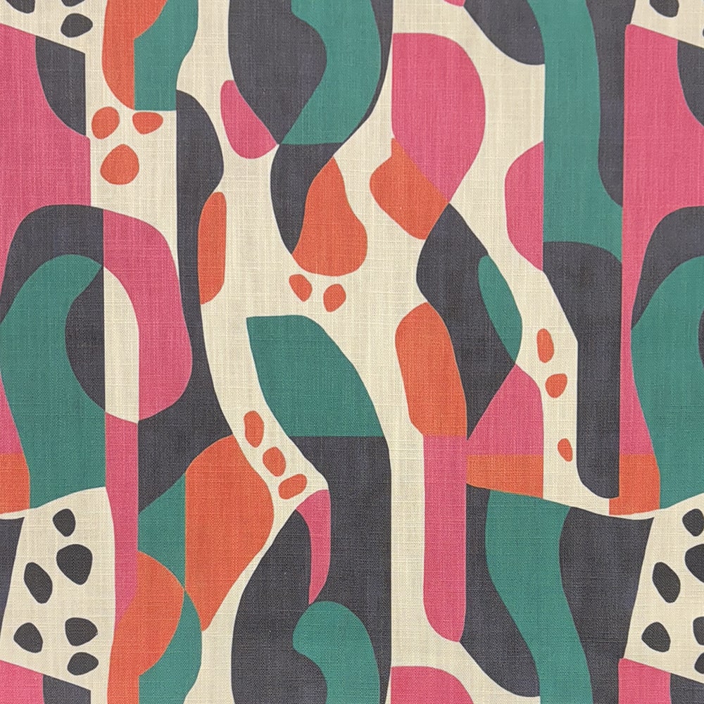 A vibrant designer upholstery fabric featuring fluid organic forms in charcoal, fuchsia, teal, and burnt orange.