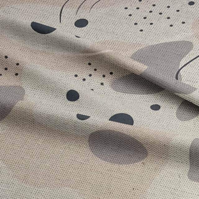 Abstract No.4 high-end upholstery fabric in neutral, natural, and grey tones on furniture – luxury abstract design