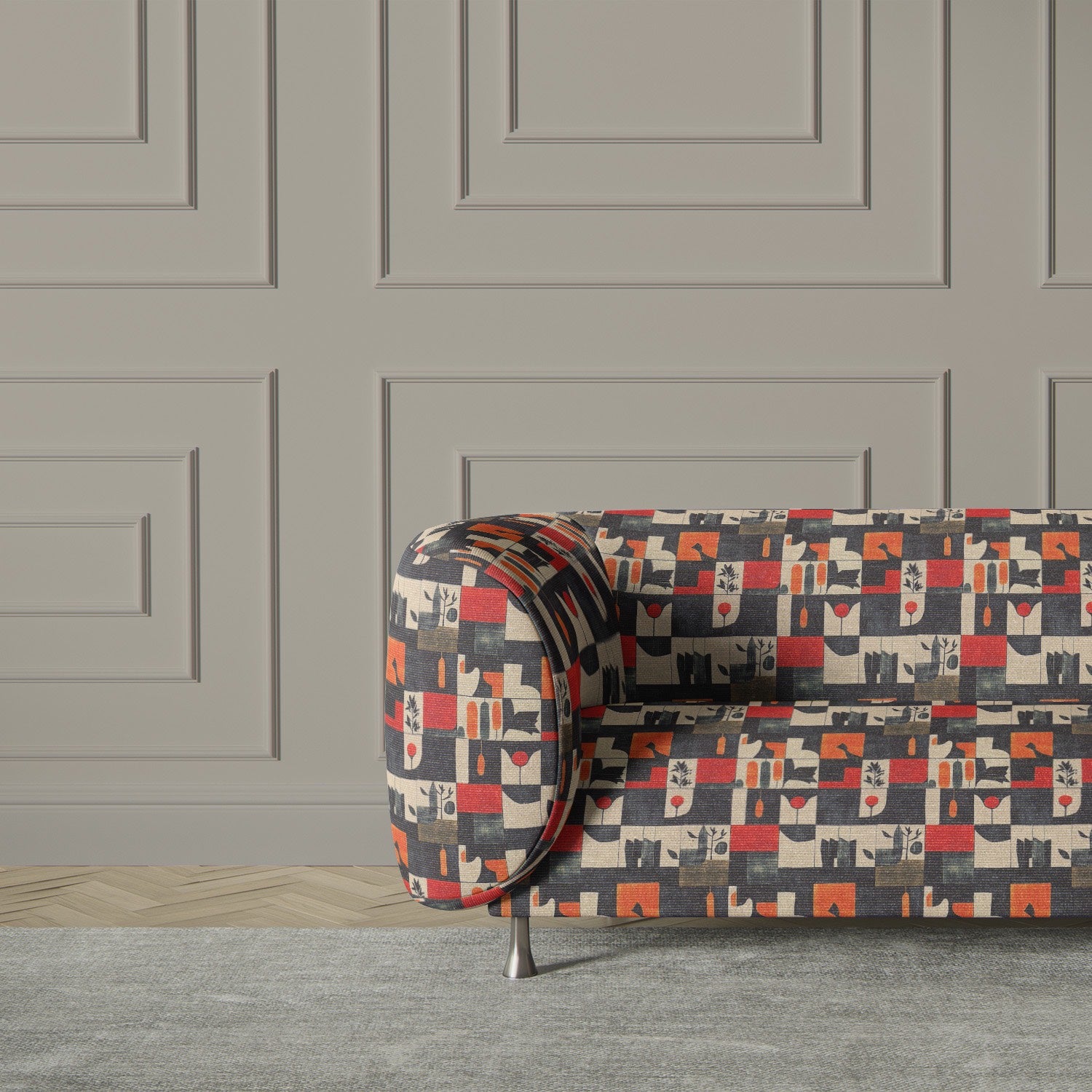 Modern sofa upholstered in Atelier No.10 geometric pattern upholstery fabric.