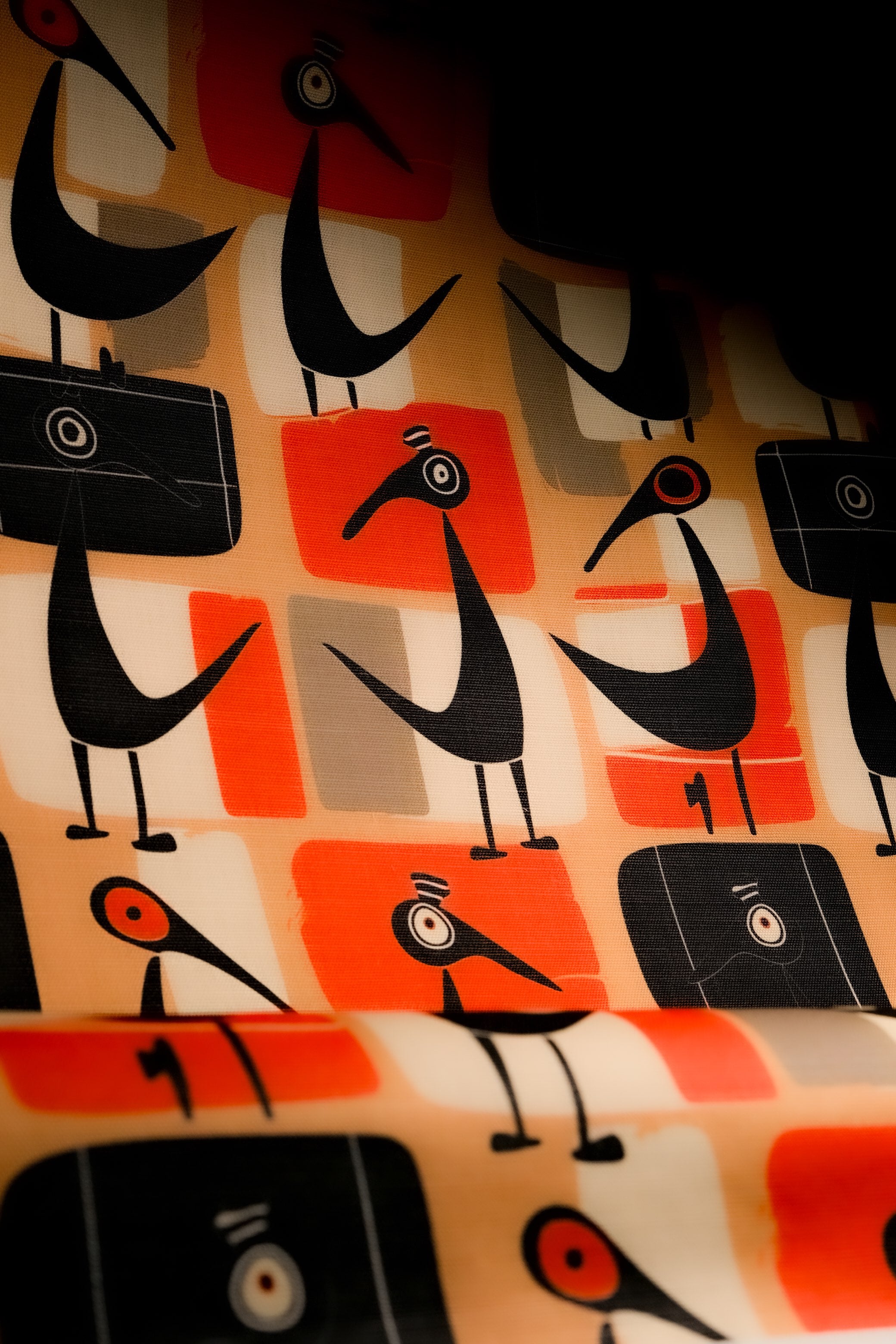 Bird No.4 upholstery fabric showcasing mid-century modern bird patterns with striking geometric shapes, ideal for standout interior furnishings.