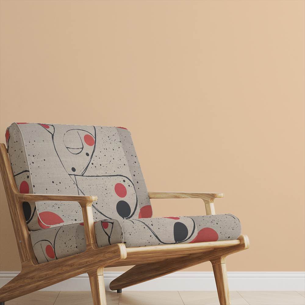 Chair view of Bird No.6 upholstery fabric in neutral palette with abstract bird design