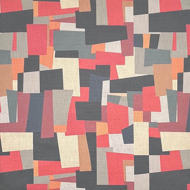 Collage No.1 luxury upholstery fabric in red, black, and grey with overlapping collage pattern – flat design