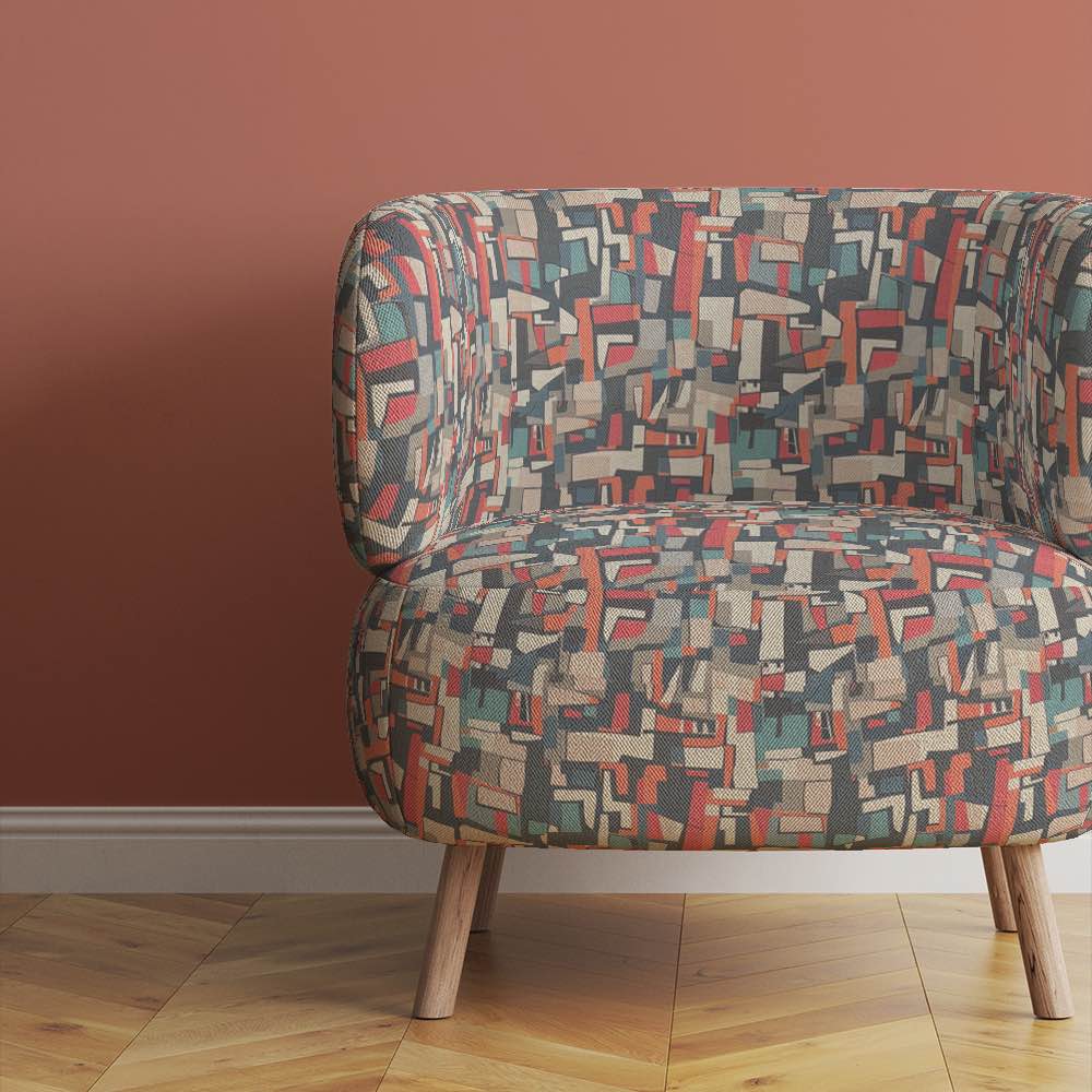 Upholstered Chair of Collage No.4 upholstery fabric in multicoloured with natural tones and overlapping collage pattern