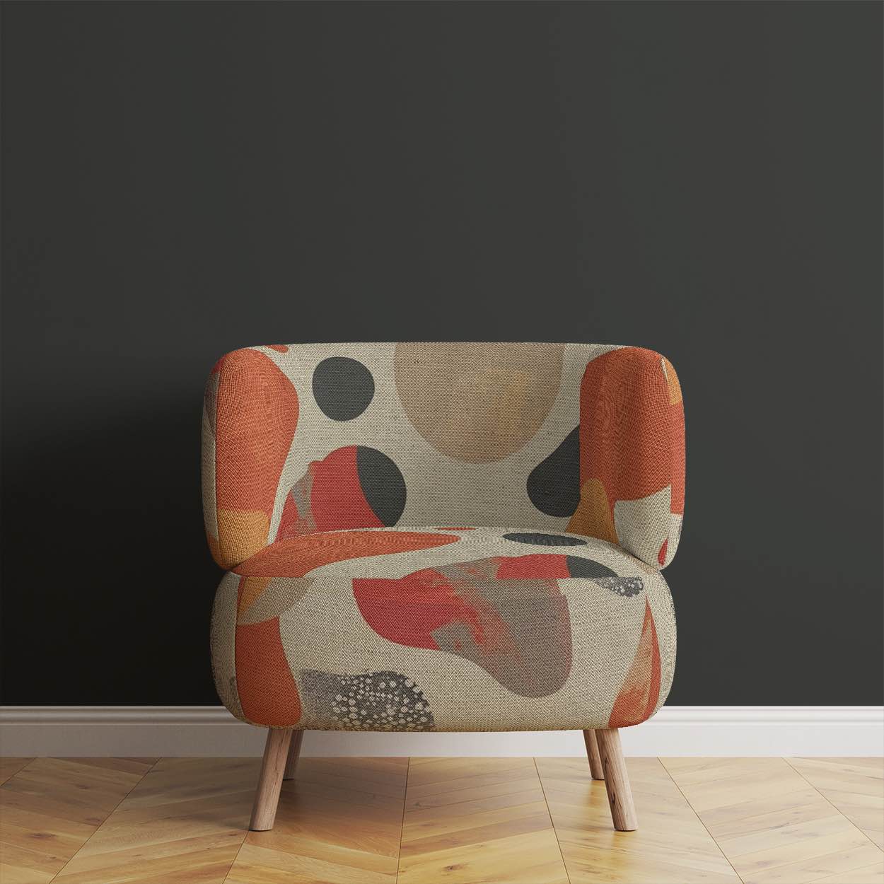 Upholstered Chair of Creation No.2 upholstery fabric in orange and neutrals with abstract overlapping shapes