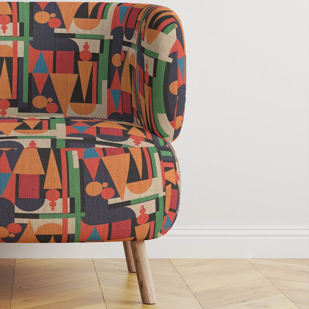 Chair view of Cubism No.13 upholstery fabric in multicoloured with Cubism art movement design