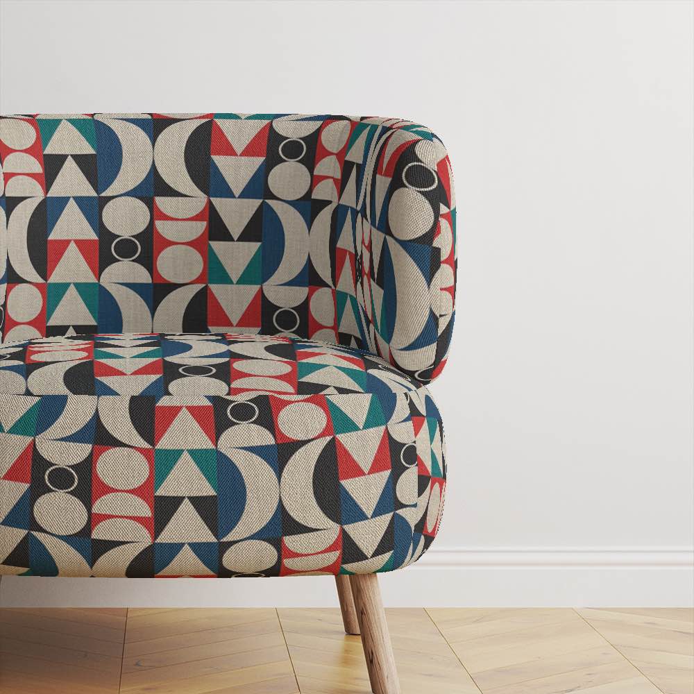 Upholstered Chair of Cubism No.18 upholstery fabric in blue, red, and neutral with Cubism art movement design