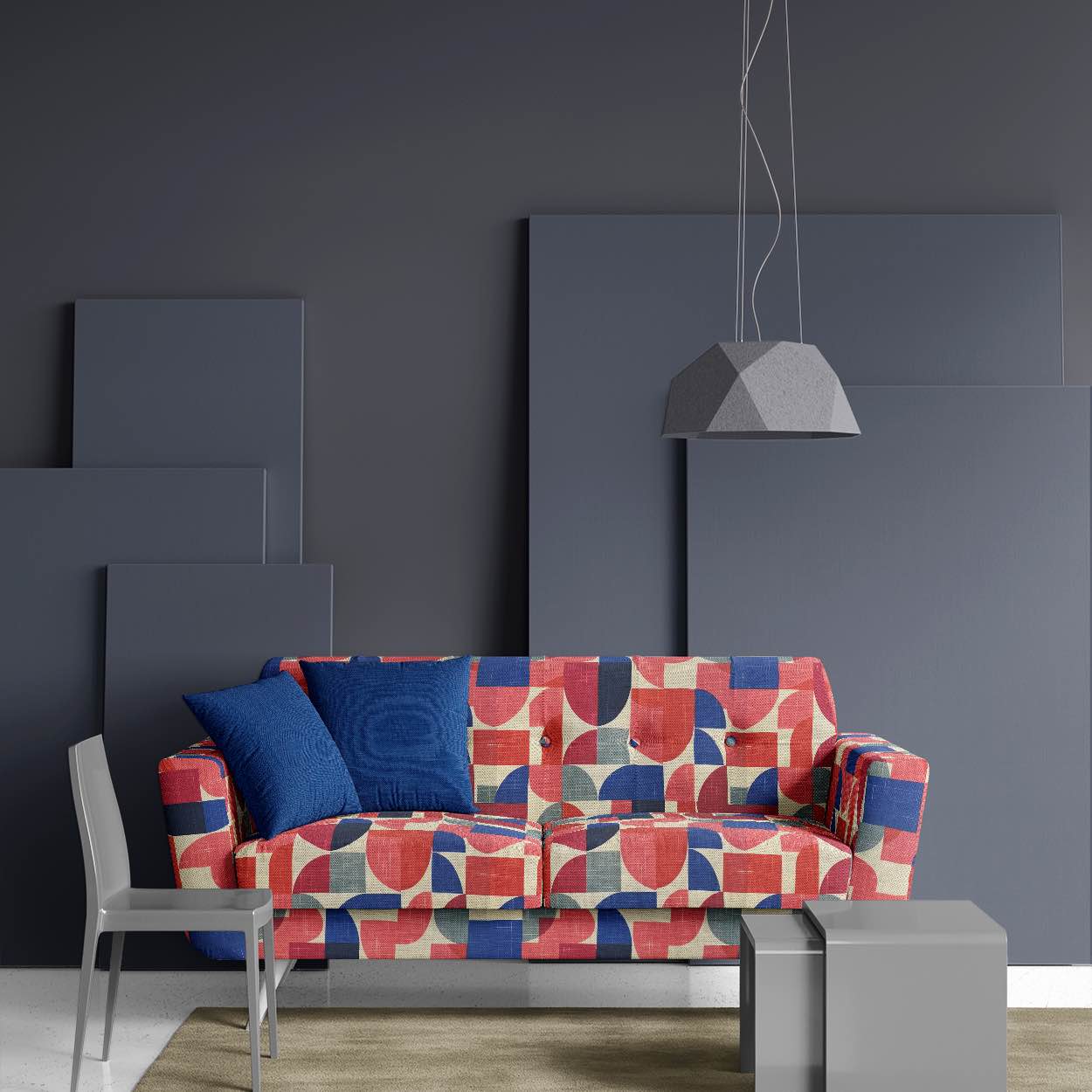 Sofa of Dimension No.1 upholstery fabric in pinks and blues with overlapping geometric shapes