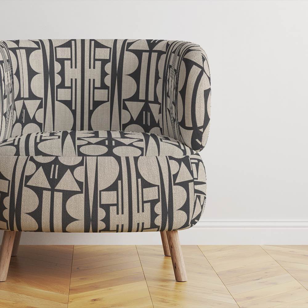 Ruffled view of Estaque No.18 upholstery fabric in black and neutral Cubism art design