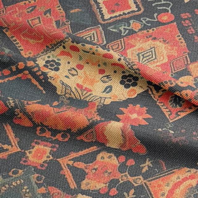 Ruffled view of Kilim No.11 upholstery fabric with autumnal colour palette and Kilim pattern