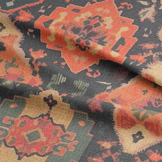 Ruffled view of Kilim No.4 upholstery fabric with autumnal colour palette and Kilim pattern