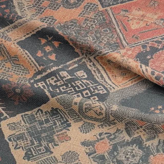 Ruffled view of Kilim No.8 upholstery fabric with autumnal colour palette and Kilim pattern