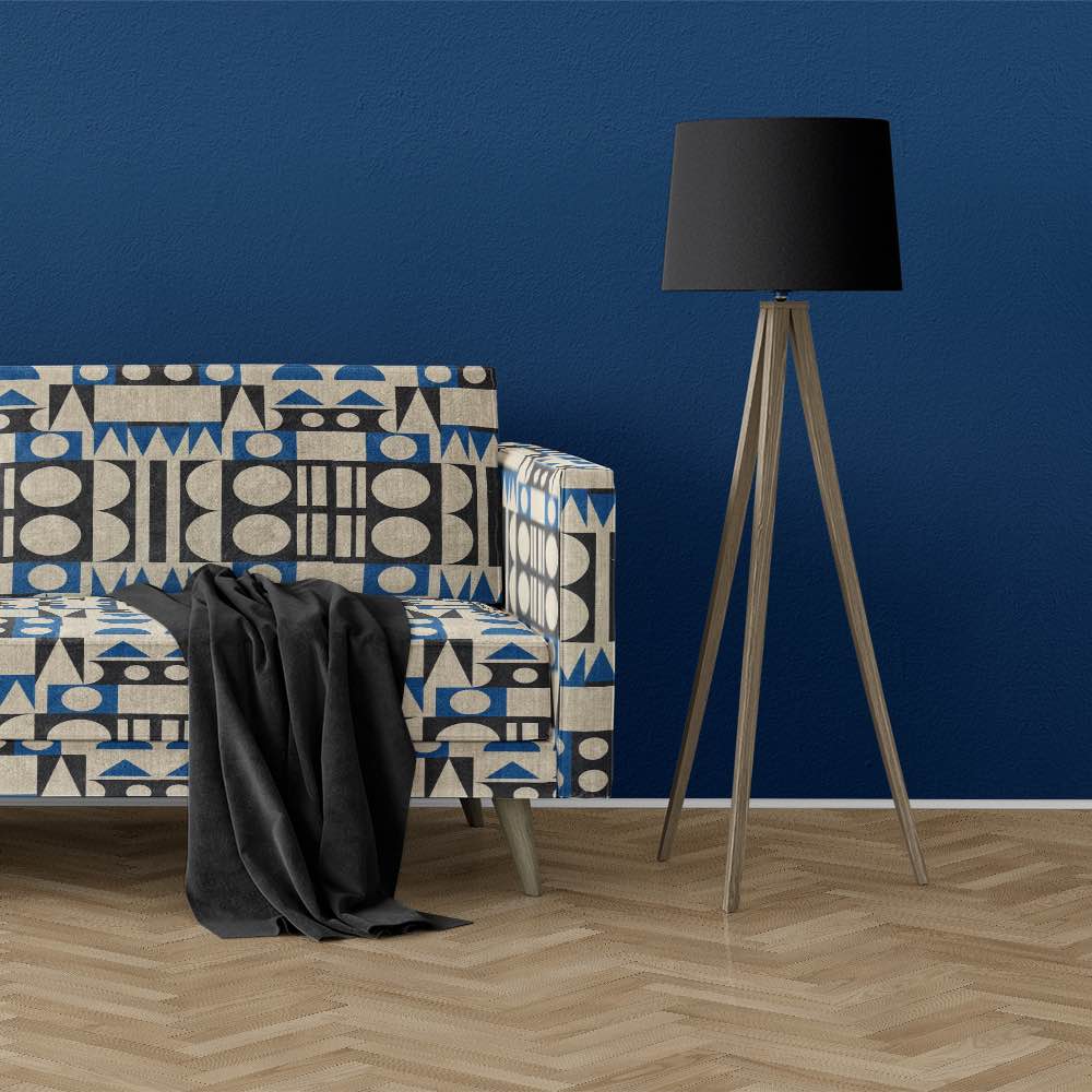 Sofa view of Malaga No.17 neutral blue and black upholstery fabric with Cubism art-inspired design