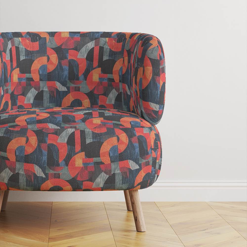 Chair view of Movements No.3 blue and orange abstract shape upholstery fabric