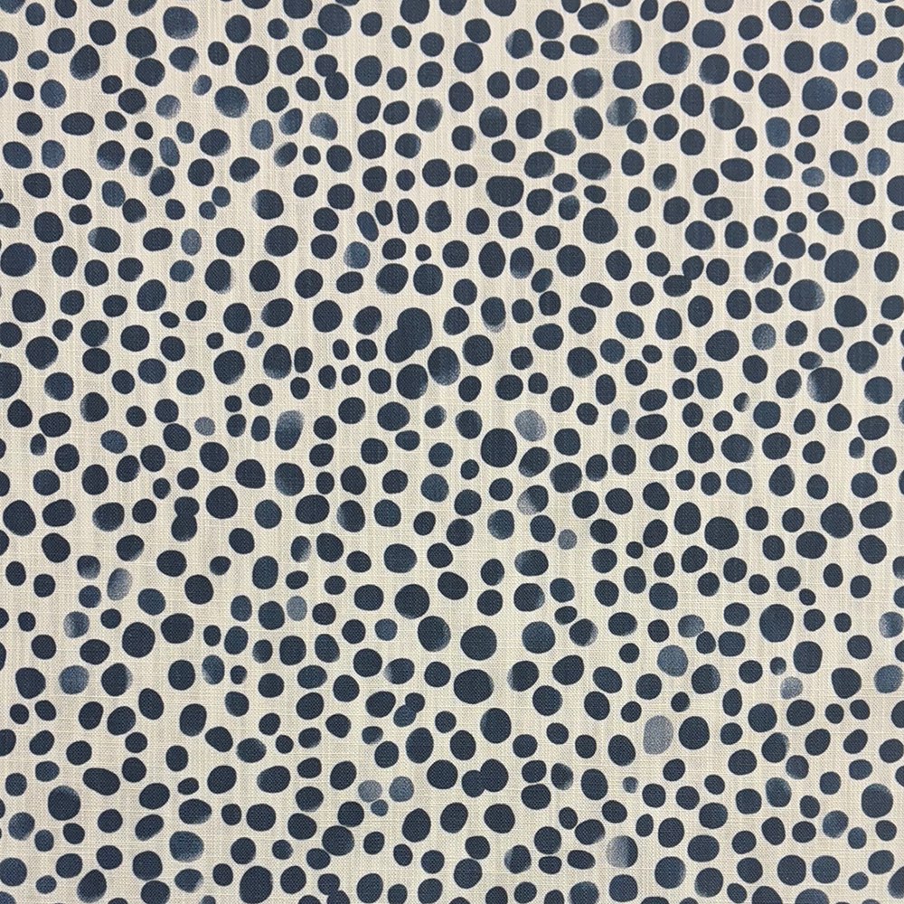 Close-up of Pointillia No.4 printed upholstery fabric featuring an organic navy dot pattern on a linen-blend weave.